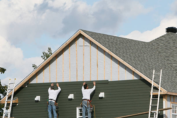 Professional Emergency Siding Repair technician working in Kennedyville, MD